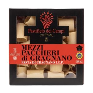 Elegante confezione cubica nera di pasta di Gragnano IGP Mezzi Paccheri Pastificio dei Campi, prodotto artigianale d'eccellenza